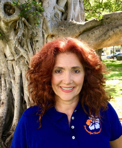 Headshot of Yolanda Spencer, co-founder, Principal and personal tour guide for Personalized Hawaii Vacations. & Tours.