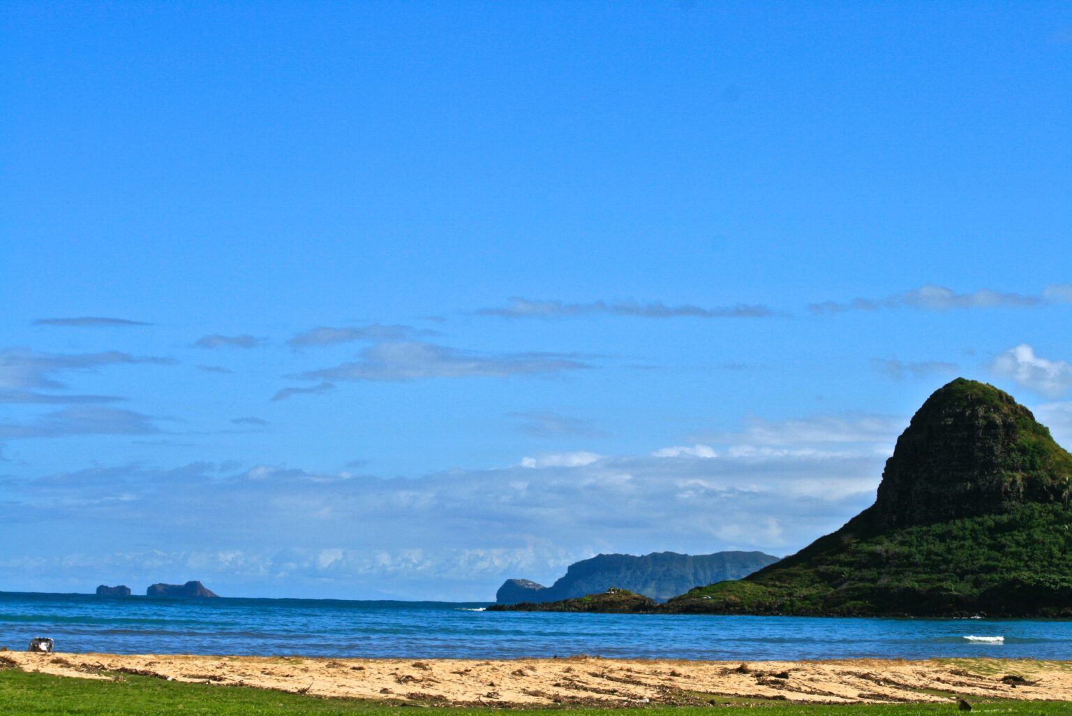 Tourists are treated to a view of Chinaman's Hat Island during their private Oahu tour.