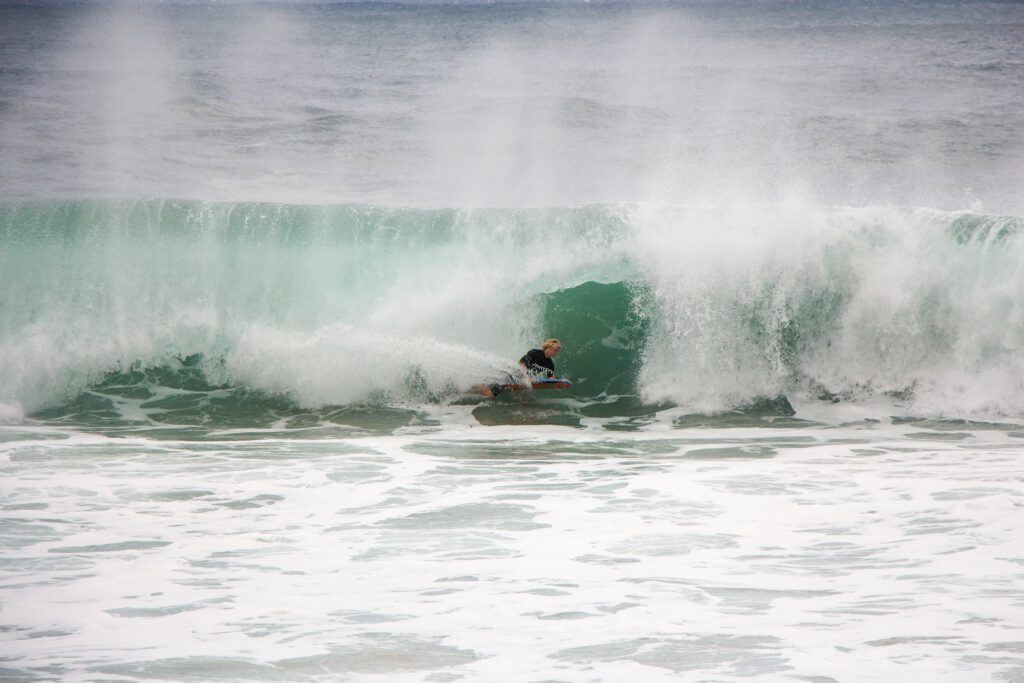 A surfer gets barreled on Oahu’s seven-mile miracle.