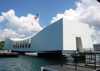 Visitors gather in the U.S.S. Arizona memorial during this half-day private Pearl Harbor tour.