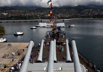 The Gun battery on the USS Missouri Overlooking the USS Arizona. Pearl Harbor tours include a visit to the "Mighty MO" Museum.